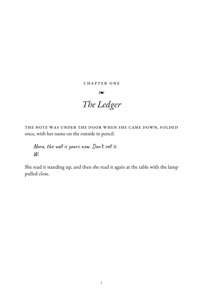 A book page with a letter set in a handwriting font.